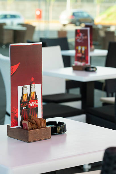 coca cola - coca cola table cafe slovenia 뉴스 사진 이미지