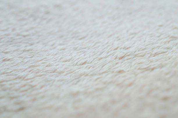 istock Beige fabric background with copy space for your text 471509756