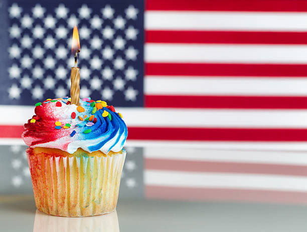 istock Fourth of July Cupcake with Light Candle 471509942