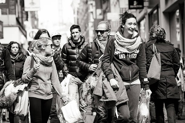 smiling woman in the crowd stock photo