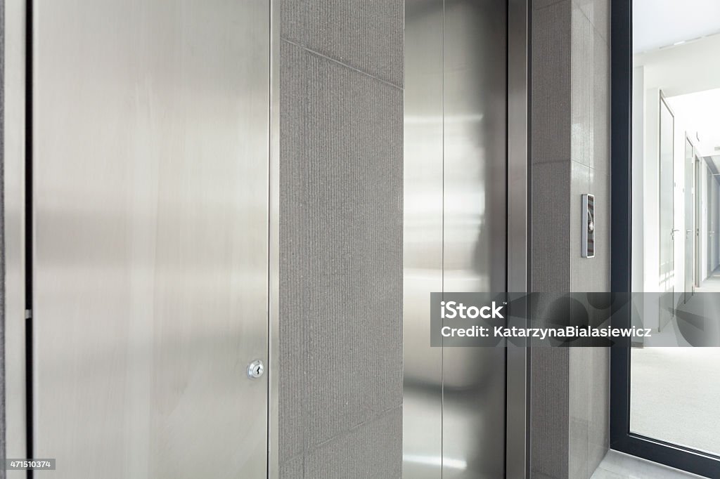 Entry to elevator View of entry to elevator in business building 2015 Stock Photo