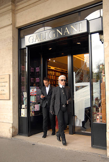 Karl Lagerfeld Paris, France - July 7, 2008: Fashion designer Karl Lagerfeld stands near Galignani bookshop in Paris.  karl lagerfeld stock pictures, royalty-free photos & images