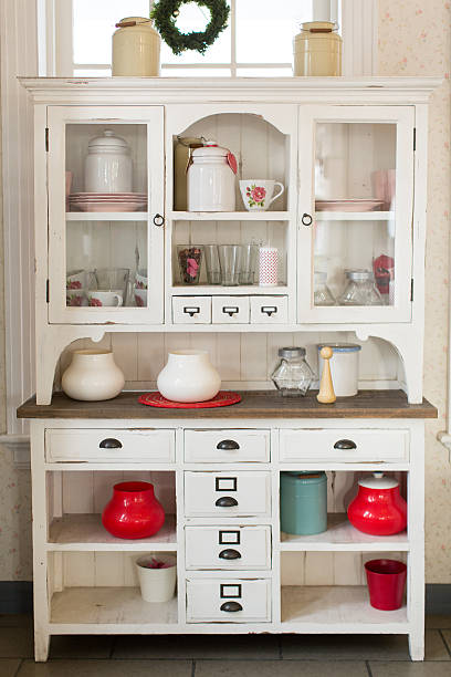A white wooden hutch in a kitchen stock photo