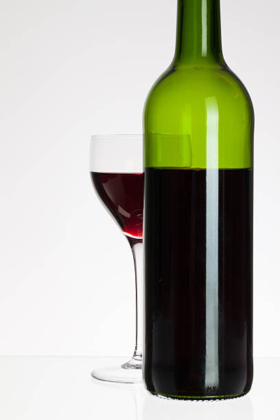 istock Glass and bottle with red wine 471512786