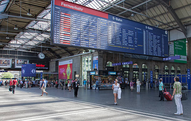 Departure board at the Zurich main railway station Zurich, Switzerland - 10 June, 2014: departure board at the Zurich main railway station (German: Hauptbahnhof). Zurich is the largest city in Switzerland and the capital of the Canton of Zurich. zurich train station stock pictures, royalty-free photos & images