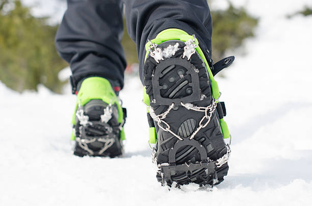 istock hiking boots with equipment for ice 471512946