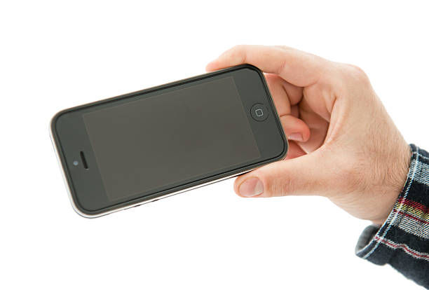 neue apple iphone 5 - holding iphone 5 business mobile phone stock-fotos und bilder