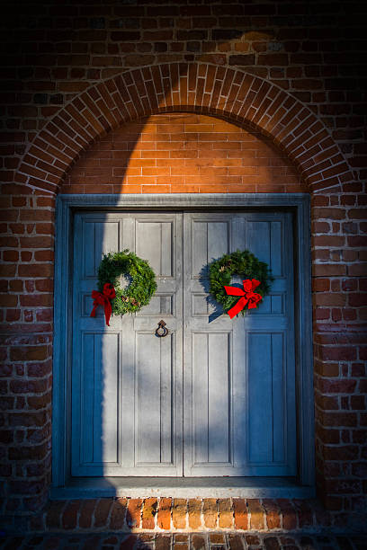 istock Church door with wreaths 471514320