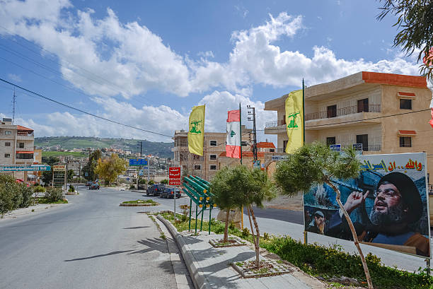 Bent Jbail, South Lebanon – February 28, 2013: Surface to Surface rockets and Hezbollah billboards in the city of Bent Jbail.