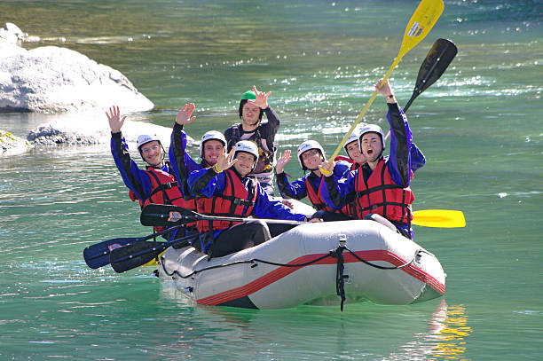 Rafting Varallo Sesia, Italy - July 18, 2010: A group of men and women enjoy a rafting center down the Sesia river in Italy rafting stock pictures, royalty-free photos & images