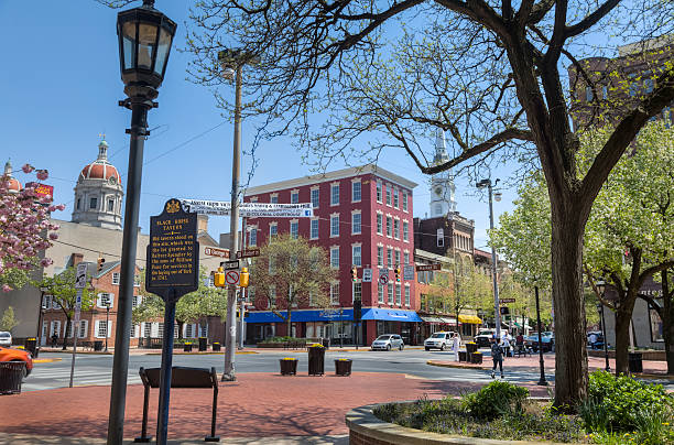 Continental Square, York, Pennsylvania York, Pennsylvania, USA - April 24, 2013: A beautiful, sunny spring afternoon on Continental Square in York, Pennsylvania (Market and George Streets). st george street stock pictures, royalty-free photos & images