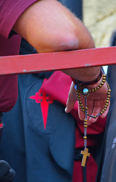 istock Costalero with rosary 471519770