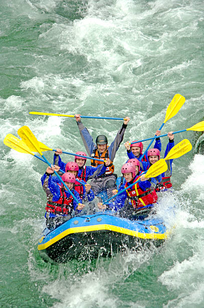 - rafting - sports team sport rowing teamwork rafting stock-fotos und bilder