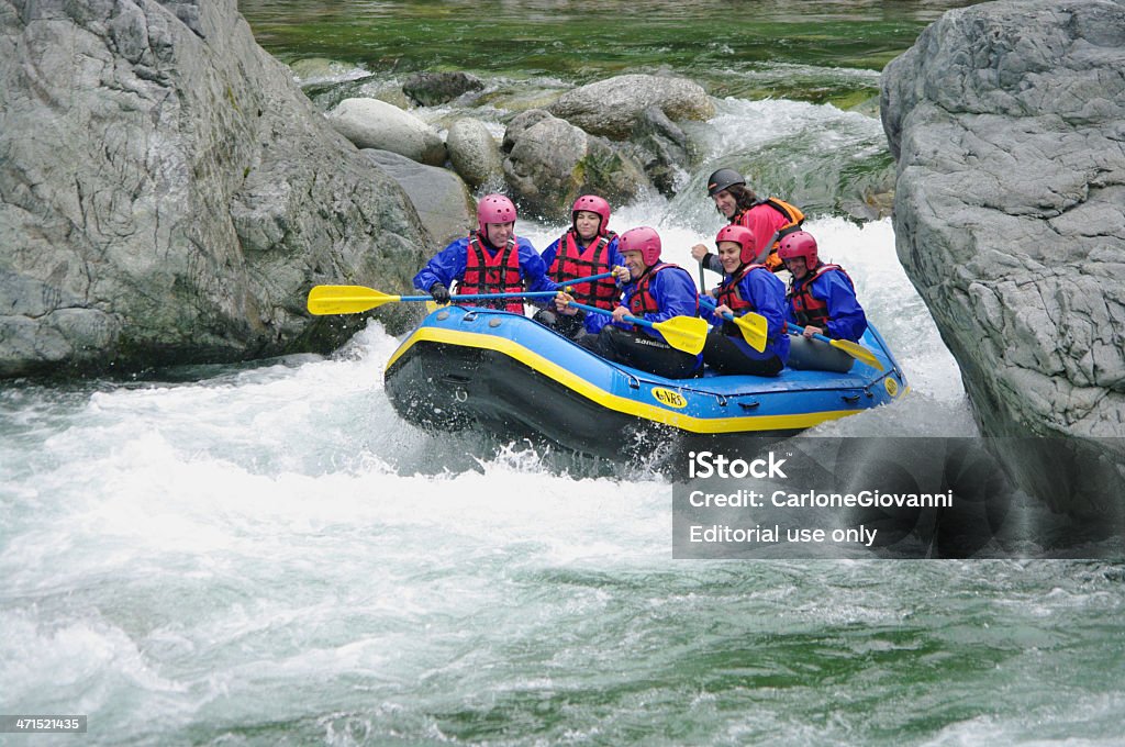 Rafting Varallo Sesia, Italy - June 6, 2010: A group of men and women enjoy a rafting center down the Sesia river in Italy Sport Stock Photo