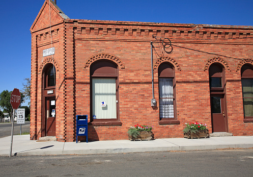 Hartline,United States- August 5,2011: Side view of beautifully preserved Colonial Revival style architecture.  This is the post Office in Hartline Washington which is a tiny town of 146 population located between Wenatchee and Spokane. The town was incorporated in 1906.
