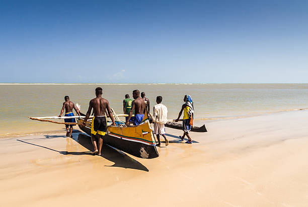 Vezo fishermen Morondava, Madagascar - October 29, 2007: VMalagasy people of ethnicity Vezo going fishing to Morondava, western Madagascar mozambique channel stock pictures, royalty-free photos & images