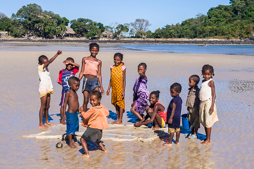 Nosy Be, Madagascar - July 1, 2008: Malagasy children on the beach of Nosy Be island, north of Madagascar 