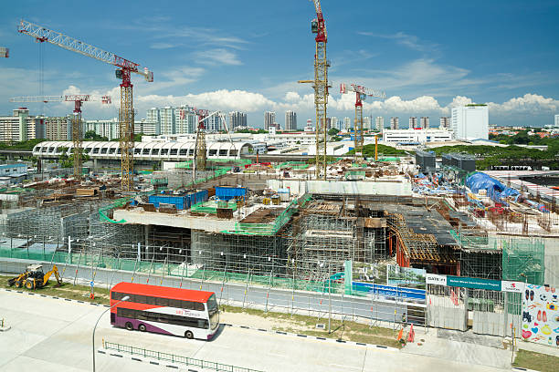 Singapore, Singapore - May 19, 2013: Construction of a 13-storey residential-retail mixed development integrated with Bedok Bus Interchange is taking place.