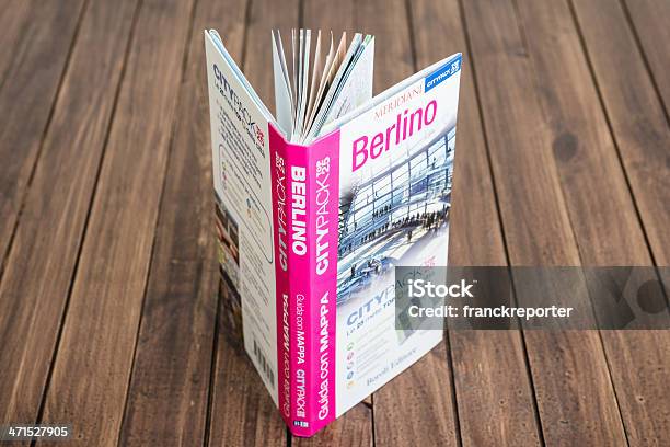 Berlin Travel Guide Books On The Wood Table Stock Photo - Download Image Now - Berlin, Book, Bookshelf