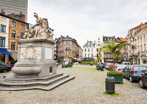 Brussels, Belgium - June 21, 2012: Place du Grand Sablon. It is an elegant square, surrounded by numerous restaurants, cafés, and antiques shops. People are resting and walking around.
