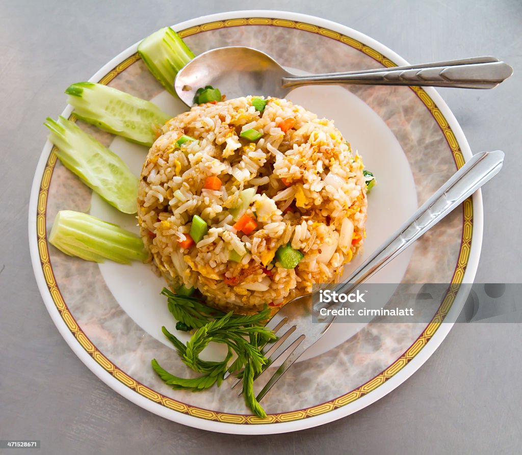 Fried rice with crab Fried rice with crab on dish with spoon Cooked Stock Photo