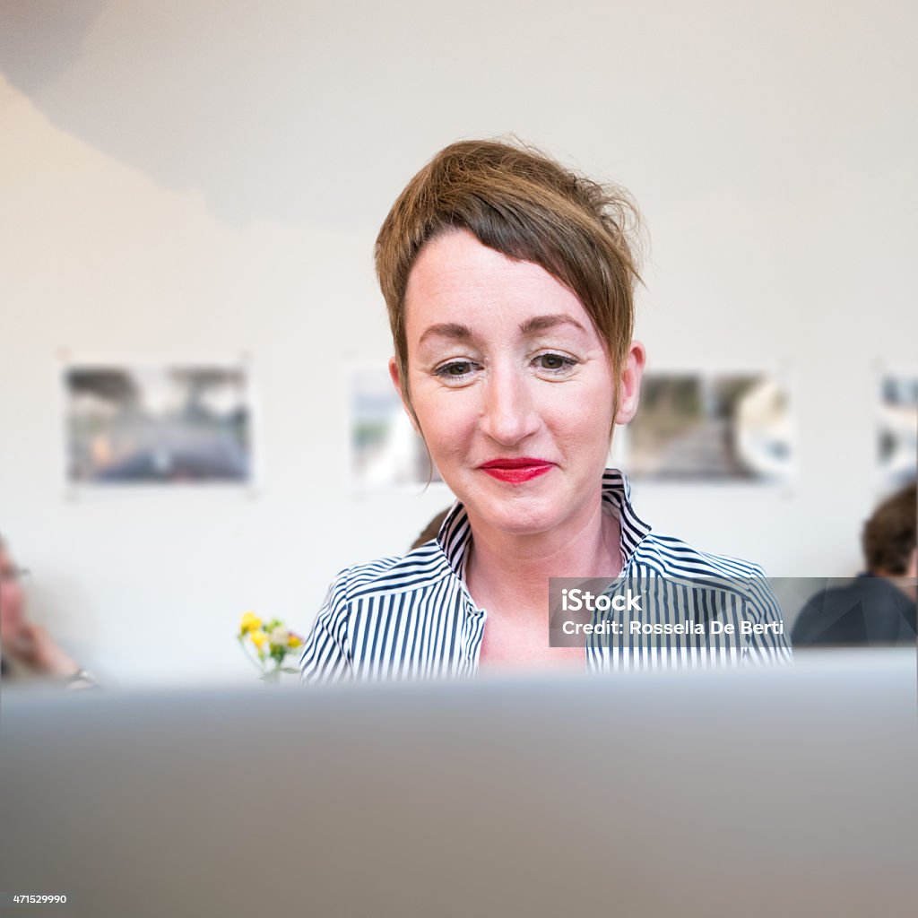 Businesswoman Attending Video Conference Businesswoman attending video conference. Education Training Class Stock Photo