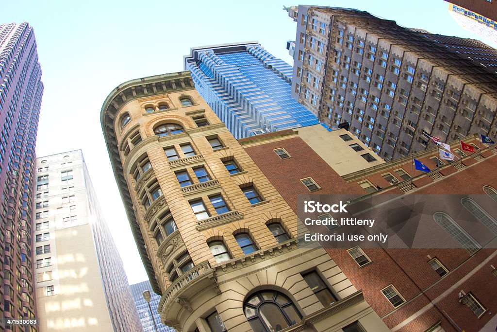 Finanical District New York City New York City, NY, USA - August 29, 2012: View of buildings from the  historic Financial District in New York City seen on August 29, 2012. This district comprises the offices and headquarters of many of the city's major financial institutions, including the New York Stock Exchange and the Federal Reserve Bank of New York. Architecture Stock Photo