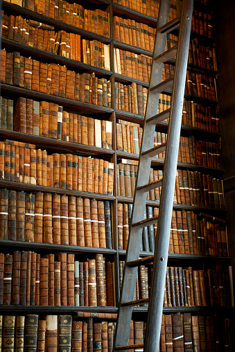 Book shelves with historic books at Trinity College Library 