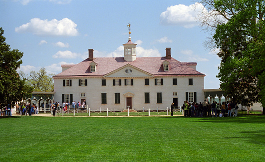 Mount Vernon, Virginia, USA - April 28, 2005: Tourists line up at Mt. Vernon, historic estate of George Washington. The estate was built in 1757 and designed by Washington himself. 