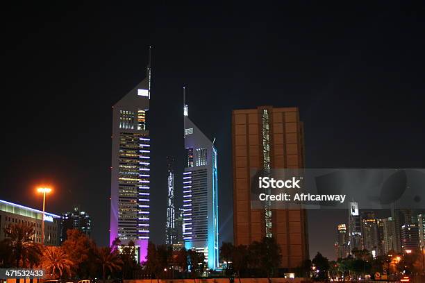 Emirates Towers At The Sheikh Zayed Road By Night Dubai Stock Photo - Download Image Now