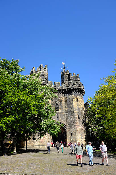 Lancaster Castle Lancaster, UK - May 25, 2013: People walking up to the Entrance to Lancaster Castle on opening day when it formally opened to the general public after being used as a Prison for many years. lancaster lancashire stock pictures, royalty-free photos & images