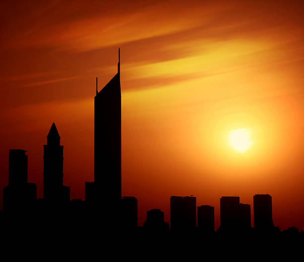 Dubai, United Arab Emirates - April 27, 2007: Dubai city at night Sheikh Zayed road at sunset