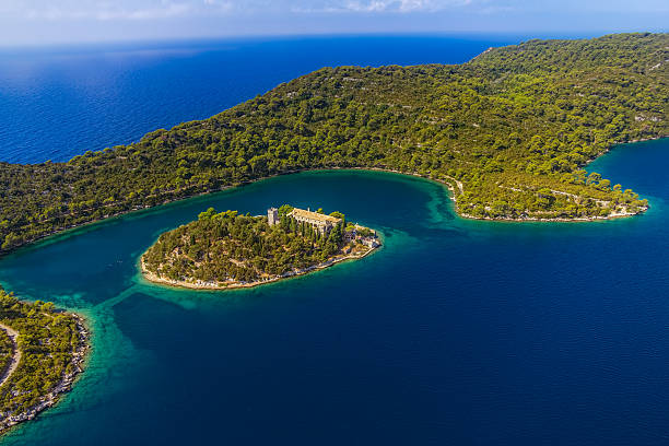 Mljet Aerial helicopter photo of Saint Mary monastery on litle island in national park Mljet, Croatia abbey monastery photos stock pictures, royalty-free photos & images