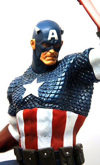 Vancouver, Canada - May 20, 2013: A figurine of Captain America, a comic book superhor created fro Marvel comics, against a white background.