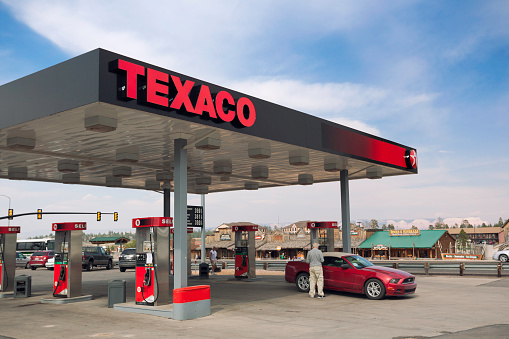 Bryce Canyon, Utah, USA - May 17, 2013: A driver stops to refuel the car on a Texaco gas station. Texaco is an american oil retail brand owned by the Chevron corporation.