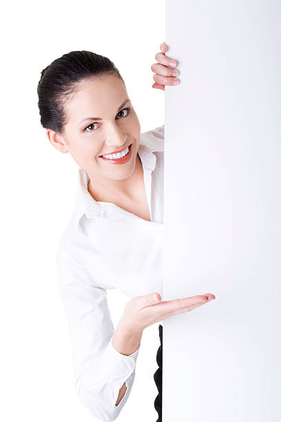 istock Young business woman holding a copy space. 471536733