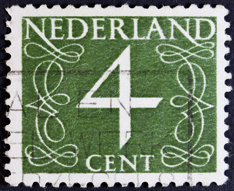 A stamp printed in the Netherlands, shows the value of a postage stamp surrounded with decorative swirls, from series \