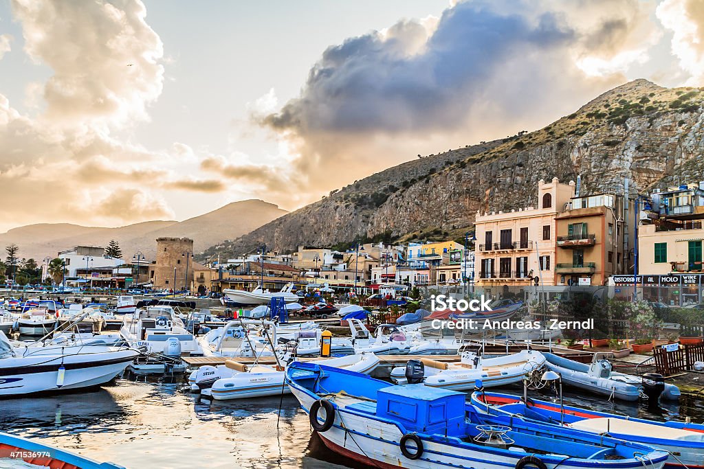 Palermo Harbor PALERMO, ITALY - JUNE 27 2014: Palermo Boat Harbor on a warm summer evening in Sicily, Italy. Lovely Mediterranean Atmosphere Palermo - Sicily Stock Photo