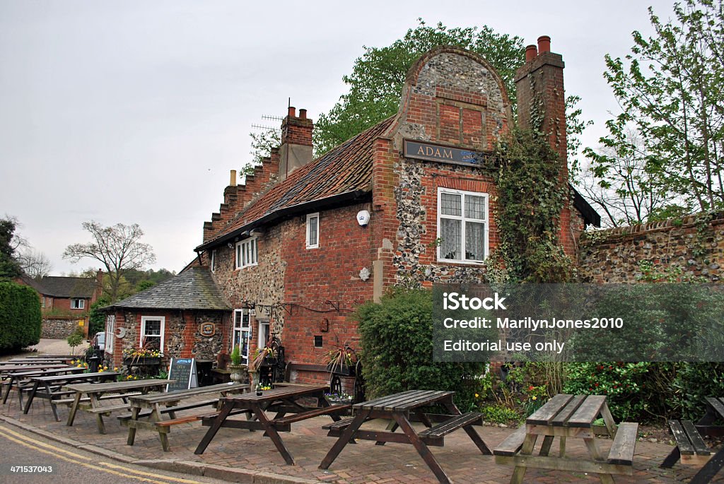 Adam and Eve Norwich, England - April 28, 2013: Adam & Eve pub was built to quench the thirst of stonemasons building Norwich Cathedral in the 12th century. It is the oldest pub in Norwich; perhaps England.  Bar - Drink Establishment Stock Photo