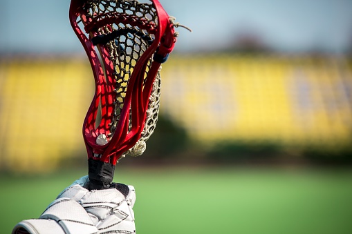 lacrosse stick on a playing field