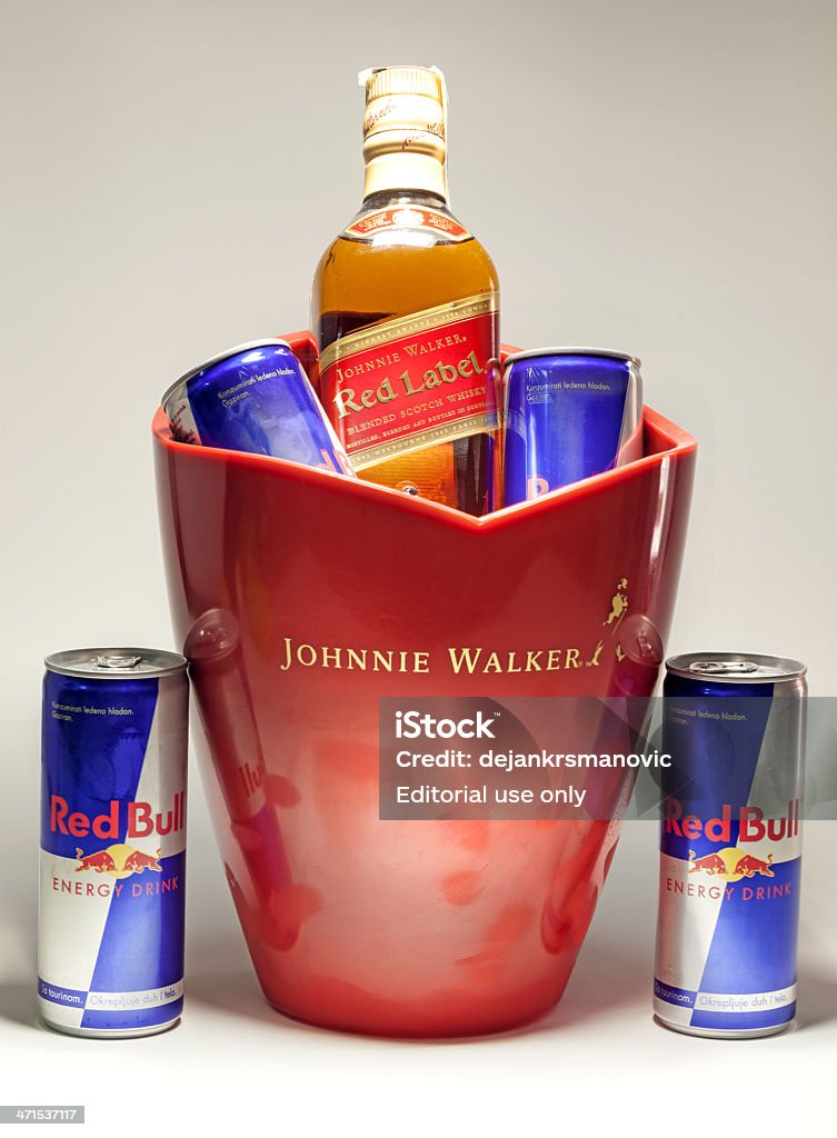 Red Bull Cans And Johnnie Walker Whiske Stock Photo - Download Image Now - Red Bull, Alcohol - Blended -