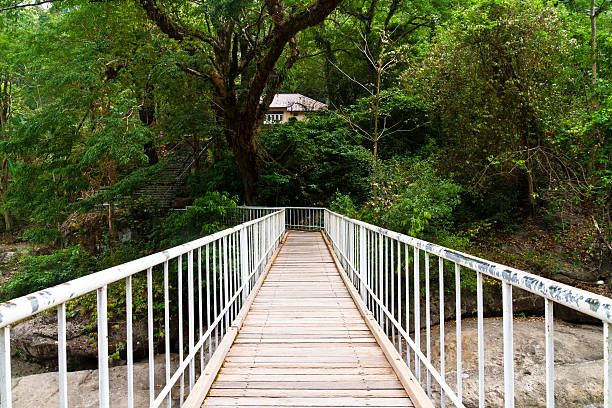 istock Wooden bridge with metal hand rail 471537301