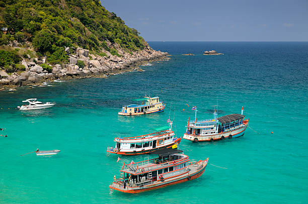 Diving Ships, Ko Tao, Thailand Ko Tao, Thailand - April 8, 2010: Typical thai Diving Ships on Ko Tao, an Island in South Thailand. Ko Tao is famous for its Dive Spots. Lots of tourists go on daily snorkeling and diving tours. koh tao stock pictures, royalty-free photos & images