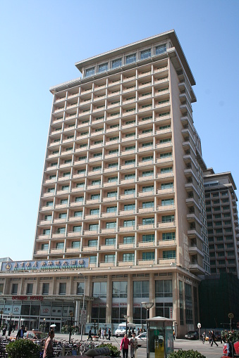 Facade of modern building under blue sky