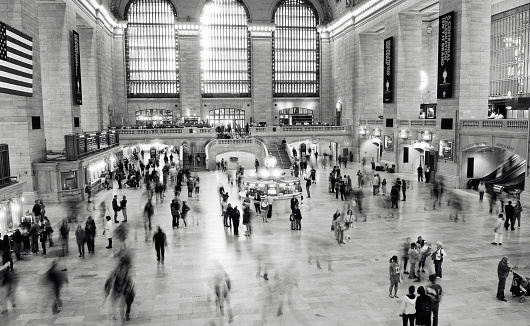 New York, New York, USA - May 28, 2013: Crowds at the Grand Central Terminal in Midtown Manhattan. Black and white image. 