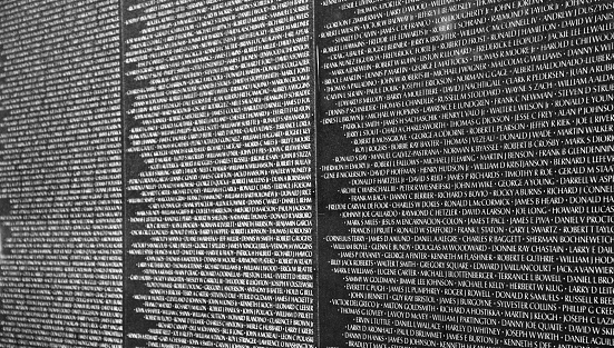 Washington DC, United States - July 15, 2010: Names of Vietnam war casualties on Vietnam Veterans Memorial