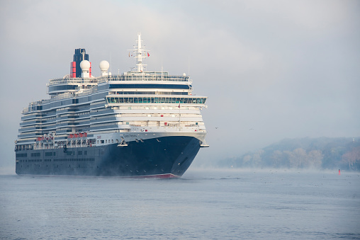 Hamburg, Germany - April 28, 2013: MS Queen Victoria arrives in Hamburg harbor after world cruise.