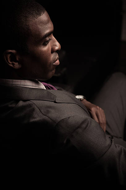 istock Pensive Young Man in Suit 471544680