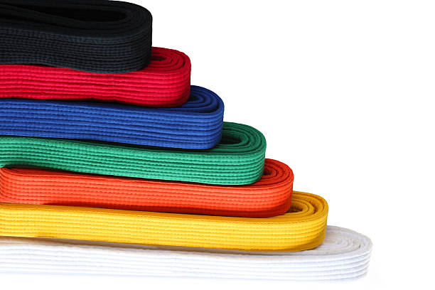 Martial Belts Seven  colors of martial arts Taekwondo belts in order from low to high yellow belt stock pictures, royalty-free photos & images