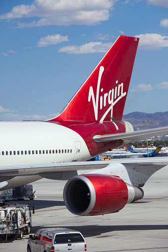 Las Vegas, Nevada, USA - May 19, 2013: Tail of a Virgin Atlantic plane gettin ready for departure. Virgin Atlantic is a British airline company and the eighth largest UK airline in terms of passenger volume.
